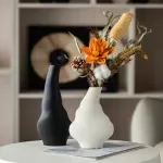 Abstract Wavy Matte White Ceramic Vase – Modern Minimalist Home Décor